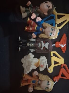 DC Comics Supergirl & Friends Keychain Set in Blue, Red, Blonde & Gold.